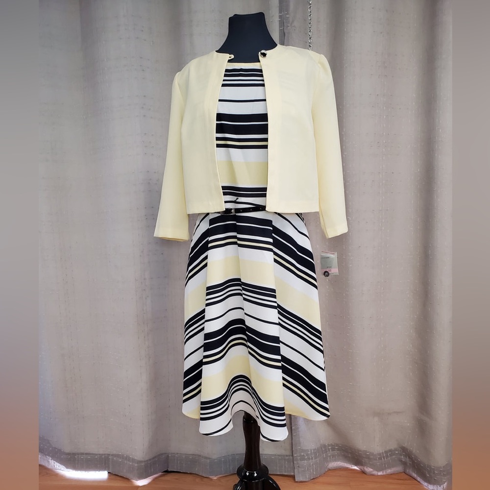 Striped dress with yellow jacket.